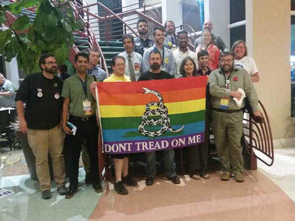 Don't Tread on Me (Gadsden) Rainbow Flag 3x5ft Held in Front of Group