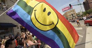 Rainbow Happy Face Flag 3x5ft on Pole at Parade