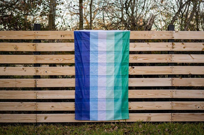 MLM Rainbow Pride Flag On Fence