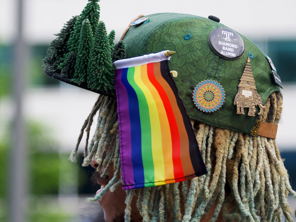 Philly Rainbow Stick Flag affixed in a Hat