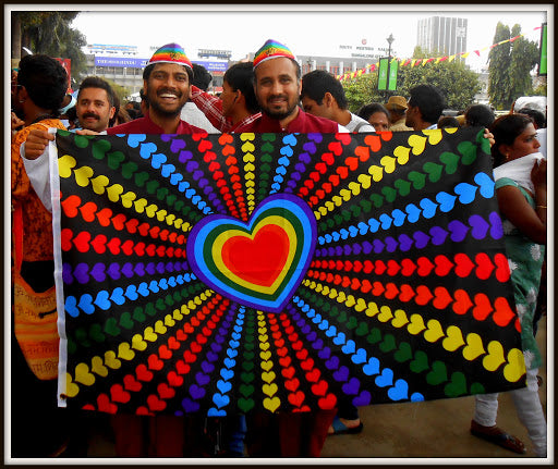 Rainbow Hearts Flag 3x5ft Held up in Front of Men at Parade