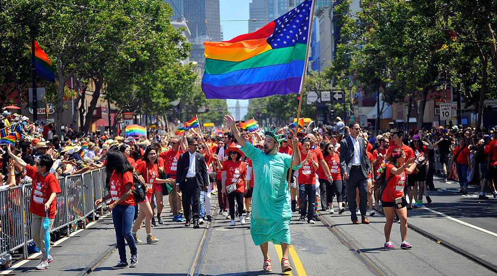 Rainbow American Flag 3x5ft on Pole at Parade